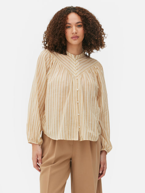 MNG -Blusa botones manga abullonada