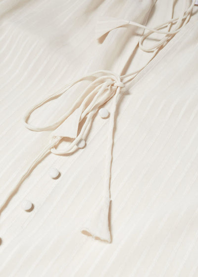 MNG - Blusa boho detalle borlas
