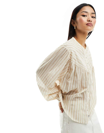 MNG -Blusa botones manga abullonada